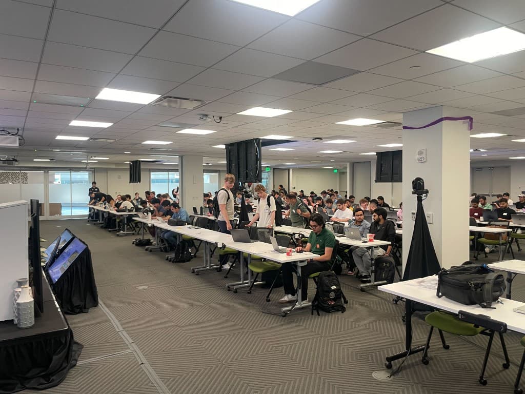 Participants working on laptops during the hackathon sprint
